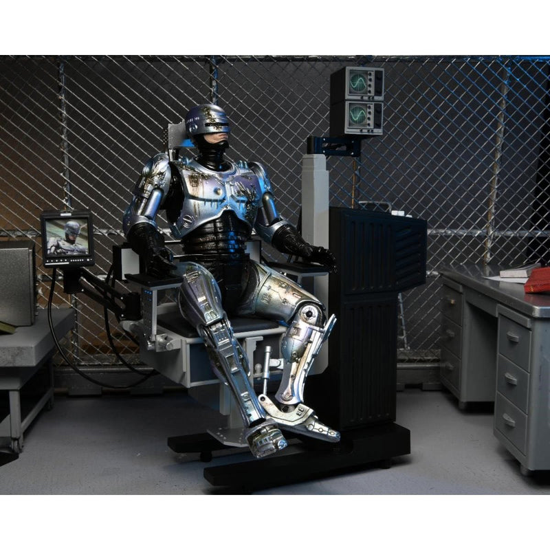 RoboCop Ultimate Battle-Damaged RoboCop with Chair 7-Inch Scale Action Figure